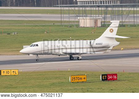 Zurich, Switzerland, January 2, 2023 Dessault Falcon 2000ex Business Aircraft Is Taxiing To The Gate
