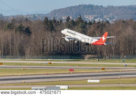 Zurich, Switzerland, January 2, 2023 Helvetic Airways Embraer E190-e2 Aircraft Leaving From Runway 2