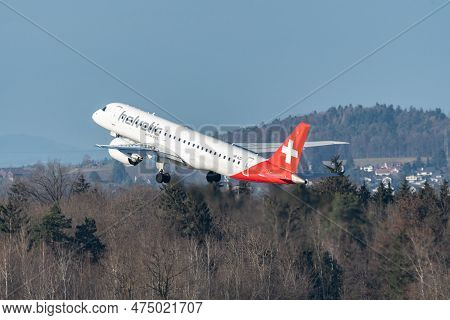 Zurich, Switzerland, January 2, 2023 Helvetic Airways Embraer E190-e2 Aircraft Leaving From Runway 2
