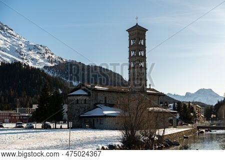 Saint Moritz, Switzerland, February 21, 2023 Historic Old Saint Karl Borromaeus Catholic Church On A