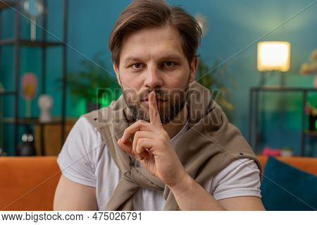 Shh Be Quiet, Hush Please. Caucasian Man With Presses Index Finger To Lips Makes Silence Hush Gestur