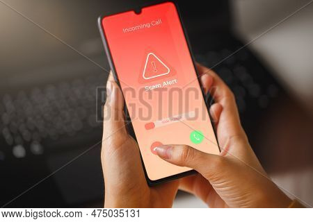 Scam Incoming Call Alert Screen On Mobile Phone. Phone Fraud Prevention Concept.