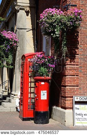 Sidmouth, Uk - August 11, 2022 - Traditional Red Telephone Box And Post Box In The Old Town, Sidmout