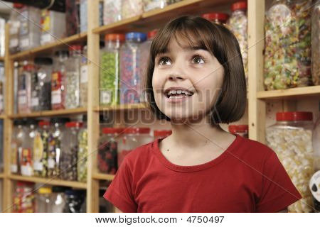 Barn i sød butik