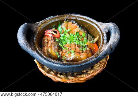 Vietnamese Fried Mackerel Fish With Sauce On Black Background