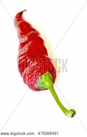 Hot Chili Peppers Are Red On A White Background. Chili Pepper On White. Hot Pepper Whole With A Gree