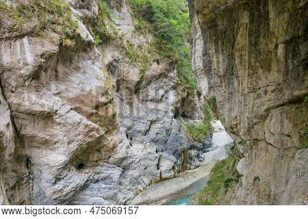 Scenic View Of Swallow Grotto Yanzikou Trail With Narrow Turquoise Liwu River Gorge And High Mountai