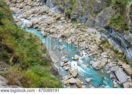 Scenic View Of Swallow Grotto Yanzikou Trail With Narrow Turquoise Liwu River Gorge And High Mountai