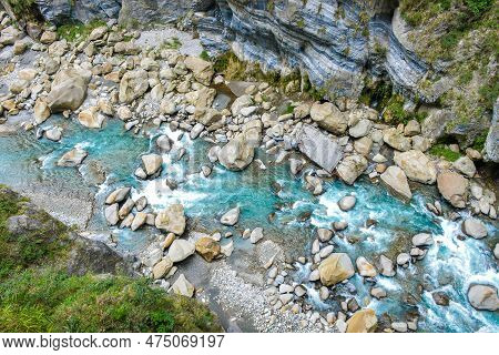 Scenic View Of Swallow Grotto Yanzikou Trail With Narrow Turquoise Liwu River Gorge And High Mountai