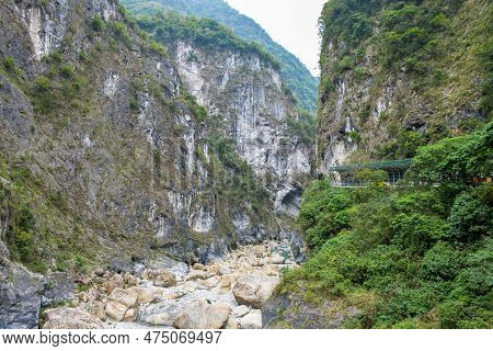 Scenic View Of Swallow Grotto Yanzikou Trail With Narrow Turquoise Liwu River Gorge And High Mountai