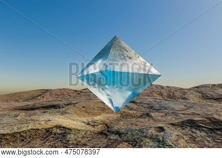 Ice Prism Pyramid Cube Hovering In The Air In Large Empty Desert Environment; Abstract Surreal Conce