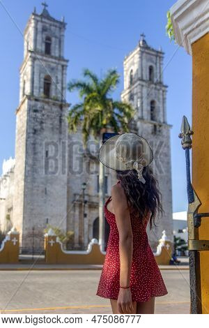 Tourist Taking A Vertical Photo With His Mobile Phone Of The Cathedral Of San Servacio During The Da