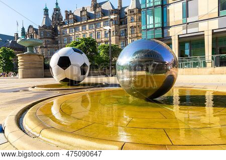 Sheffield, Uk - June 16, 2022: The Sculptures Of Football Ball And Stainless Steel Spheres And Sheff