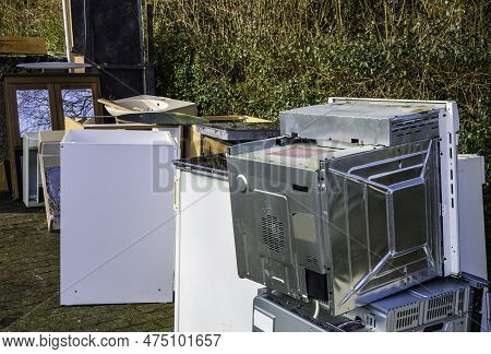 Electro And Bulky Waste Stands On Roadside