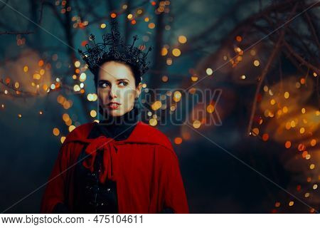Portrait Of The Evil Queen Standing In The Dark