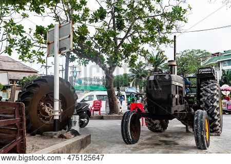 Thailand, Patong - 03.27.23: John Deere 2040 Tractor Monument At Patong Beach Phuket