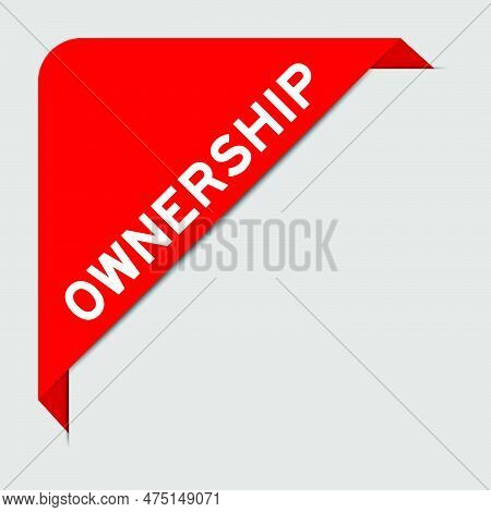 Red Color Of Corner Label Banner With Word Ownership On Gray Background