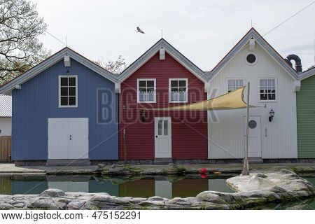 Vibrant Coloured Wooden Beach. Red. Blue. White. High Quality Photo