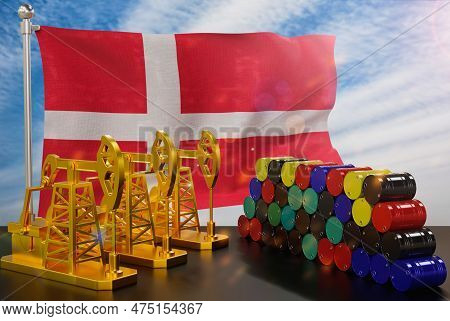 The Denmark's Petroleum Market. Oil Pump Made Of Gold And Barrels Of Metal. The Concept Of Oil Produ
