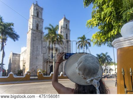 Sexy Tourist Girl With Hat In Front Of The Background Of San Servacio Cathedral In The Mexican City