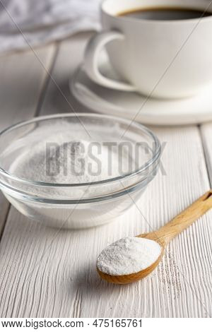 Herbal Sweetener Stevia In Spoon And A Cup Of Coffee