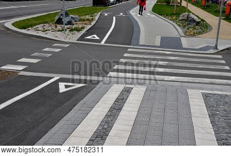 Promenade For Pedestrians And Cyclists With A Dividing Island Between The Lanes And Road, Road Marki