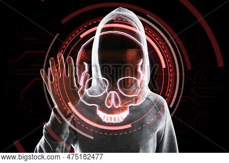 Hacker Using Digital Red Skull Hologram On Dark Background. Ransomeware, Virus And Pirate Threat Con