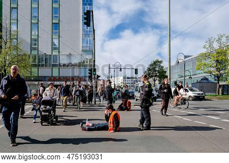 Berlin, Germany - April 24, 2023: Protesters From The Group Last Generation Sitting On The Street An