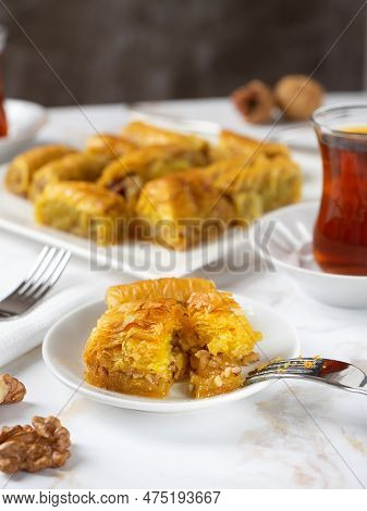 Baklava. Traditional Turkish Desserts Baklava With Turkish Tea. Crispy Walnut Baklava