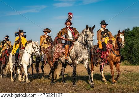 Gniew, Poland, Aug 2020 Polish Hors Cavalry, Hussars. Group Of Warriors Horseback Riding, Historical