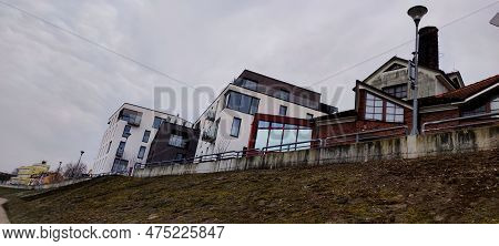Modern And New Apartment Building. Multi-storey Modern, New And Stylish Apartment Building. Cafe Kaf