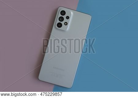 April 22, 2023 Ukraine City Kyiv Smartphone Samsung Galaxy A 73 On A Colored Background