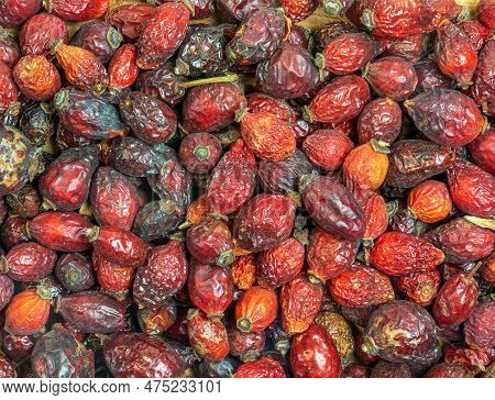 Background Made Of Dry Rose Hips. Fharmaceutical Raw Materials. Healing Herbs Rosae Fructus. Rosae P