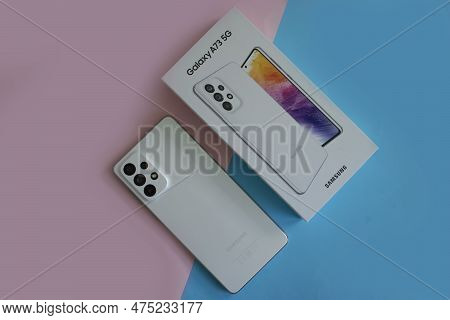 April 22, 2023 Ukraine City Kyiv Smartphone Samsung Galaxy A 73 On A Colored Background