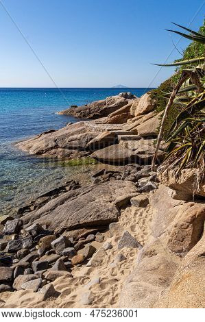 Sandy Little Beach With Big Rocks At Seccheto, Elba Island, Italy