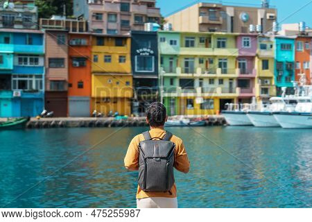 Man Traveler Visiting In Taiwan, Tourist With Backpack Sightseeing In Keelung, Colorful Zhengbin Fis
