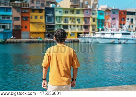 Man Traveler Visiting In Taiwan, Tourist Sightseeing In Keelung, Colorful Zhengbin Fishing Port, Lan