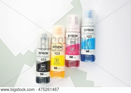 Four Bottles Of Ink Epson, Yellow, Red, Blue, Black, Built-in To The Epson L3150 Series Printer.