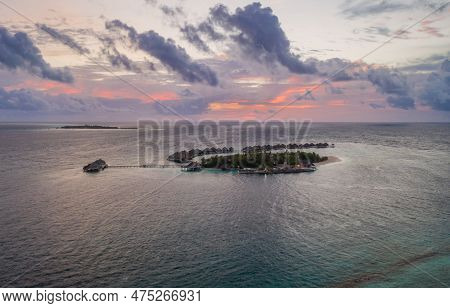 Adaaran Prestige Vadoo Resort At Sunset, Maldives. Aerial Drone Shot. July 2021.