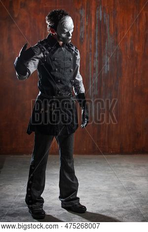 A Young Man In A Victorian-style Suit, A Retro Character. Antihero Or Tragic Character, In A Mysteri