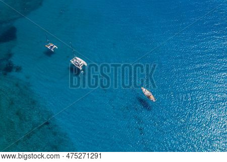 Top View Of Jacht In Turquoise Water In Gran Tarajal, Canary Islands, Lobos, Spain. Aerial Drone Vie