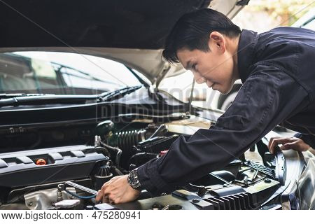 Auto Mechanic Working In Garage, Technician Man Working In Auto Service, Mechanic Repairman With A W