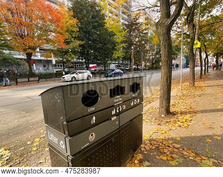 Toronto, Canada - 25 October 2022: A Garbage Or Litter Box On The Sidewalk Of A Street For Recycling