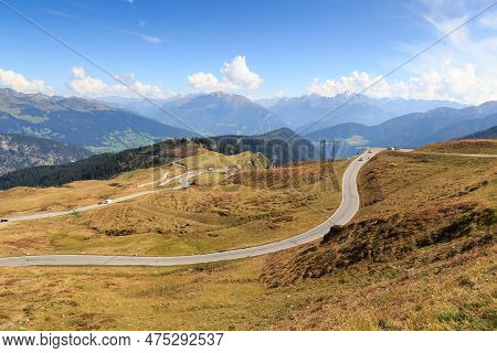 Panorama View Of Road With Serpentines At Mountain Pass Jaufen Pass In South Tyrol, Italy