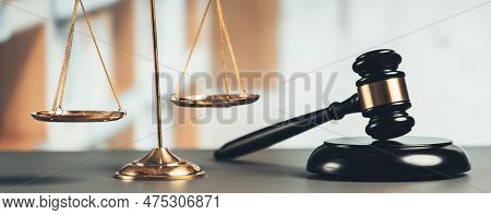 Shiny Golden Balanced Scale And Wooden Gavel In Court Library Background As Symbol Of Justice And Le