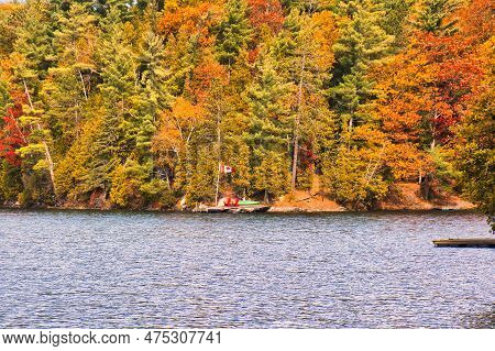 Kawartha Lakes, Canada - 20 October 2022: A Cabin On The Shore Of A Small Lake In The Kawartha Lakes
