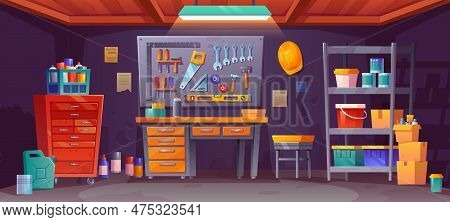 Night Workshop Interior In Garage Storage Room With Tool Shelf And Lamp Spotlight. Wood Table In She