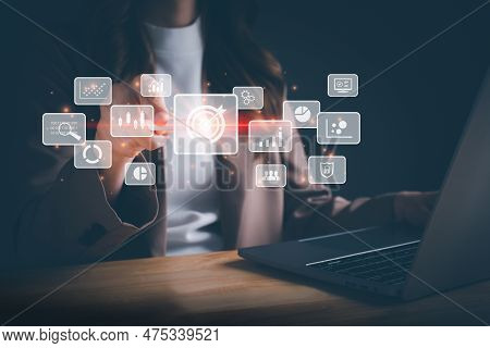 Businesswoman Working On Laptop And Using A Stylus Pen For Big Data Analytics And Business Intellige