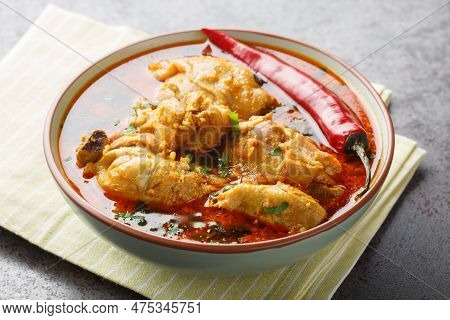 Malvani Masala Spicy Chicken Curry With Coconut Closeup On The Bowl On The Table. Horizontal