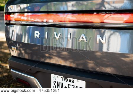 Rear View Futuristic-looking Rivian Branding Text With Plate Number Of Brand-new Electric Vehicle R1